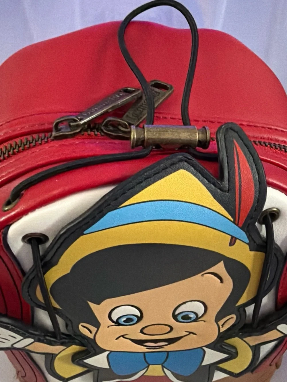Pinocchio Character Backpack — Red, Blue, Yellow